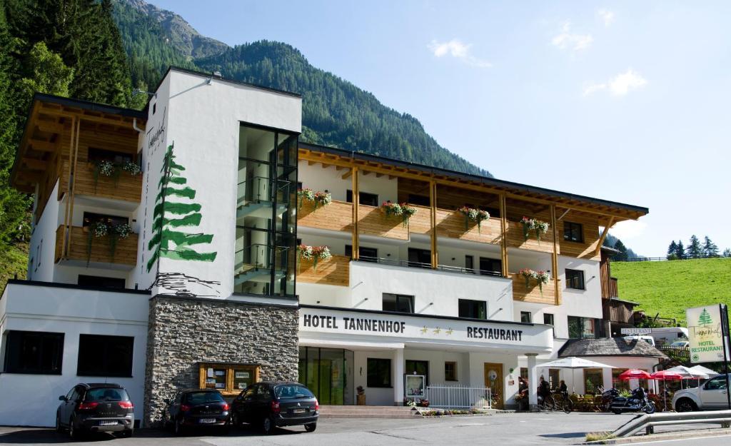 Hotel Tannenhof against the mountain in St. Anton