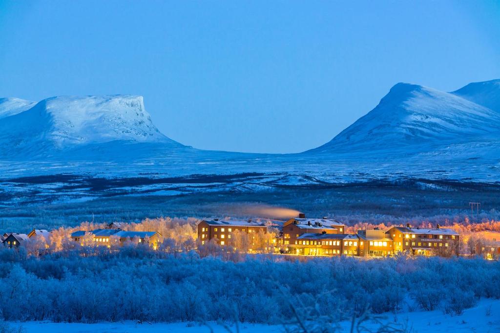 STF Abisko Turiststation in snow at dusk